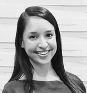 black and white headshot of smiling woman